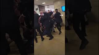 Israeli protesters dragged out of Knesset after attempting to glue themselves to the floor