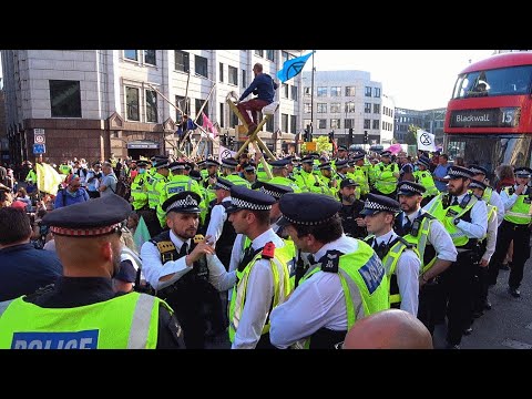 Police deal with Extinction Rebellion activists in the City of London