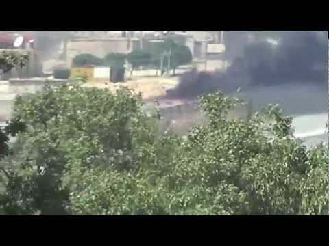 اشتعال النيران في بعض آليات من الرتل المتجه الى حلب جراء استهداف من قبل كتيبة درع الشمال وكتيبة شهداء الحرية في بلدة خان السبل في ريف إدلب