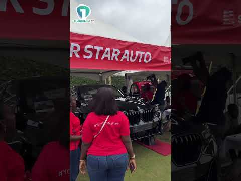 Absa MD Explores the Cars on Display at Absa Auto Fair