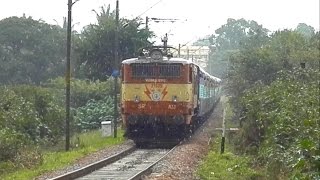 preview picture of video 'AJJ WAM4/6PE with Hubli - Kochuveli Superfast in Heavy Drizzle'