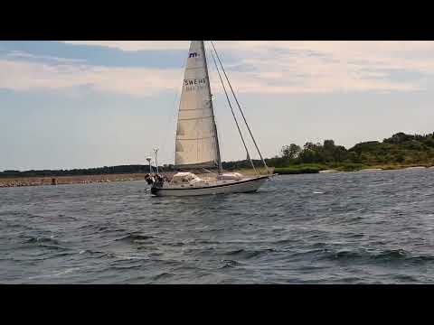 Sailing through Bridge of Hasslö (Hasslöbron), just outside Karlskrona, Sweden august 2022.