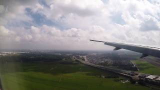 Qatar Airways Boeing 777-300ER landing at Schiphol