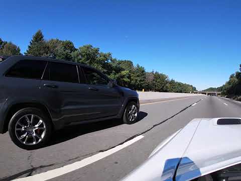 Jeep SRT vs Dodge challenger scatpack