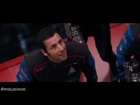 Official Pixels trailer frame: Pac-Man bears down a Manhattan avenue as sirens wail and orchestral hits rise