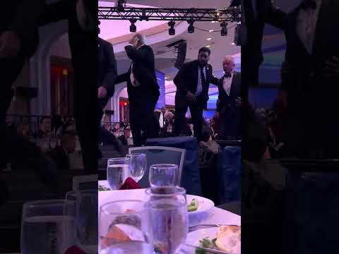 U.S. Health and Human Services Secretary Robert F. Kennedy Jr. escorted by federal agents