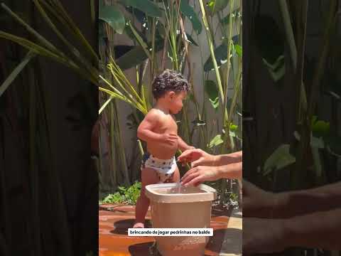 O encanto do simples: por que jogar pedrinhas no balde ainda diverte.