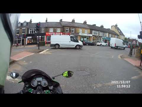 Mercedes driver fails to look before changing lanes, then gets angry.