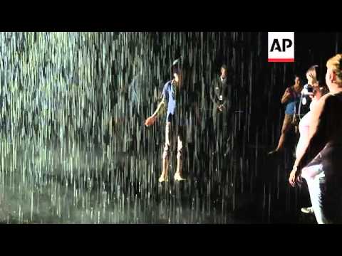 Rain Room installation at New York's Museum of Modern Art draws a crowd
