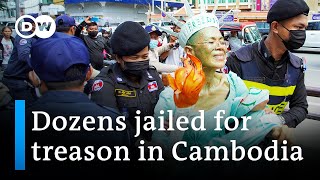 Cambodia convicts opposition figures in mass trial | DW News