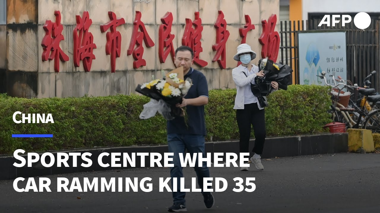 Rain and flowers at southern China sports centre where car ramming killed 35 | AFP