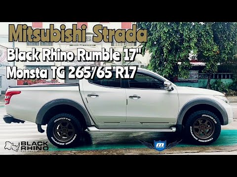 Black Rhino Rumble 17" wrapped with Monsta TG 265/65 R17 on this Mitsubishi Strada @ RNH Tire Supply