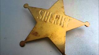 Exarphcomanantabitom - Rusty Sheriff's Badge