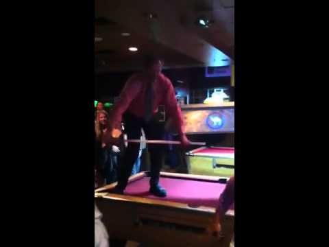 Dad dancing on pool table at Murphy's