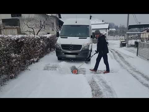 STIHL KM131 POWER SWEEPER SNOW ACTION.