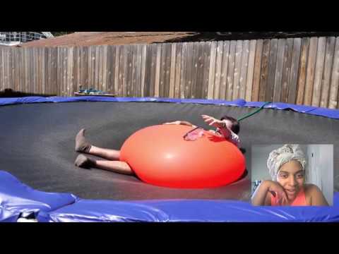 Couple React: Crushed by a Giant 6ft Water Balloon - 4K - The Slow Mo Guys