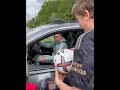 Leandro Trossard and Emile Rowe at Arsenal training ground sign autographs for fans