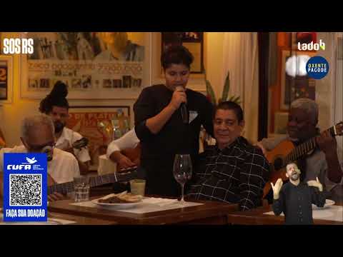 Neto do Zeca Pagodinho, cantando a música Naquela Mesa