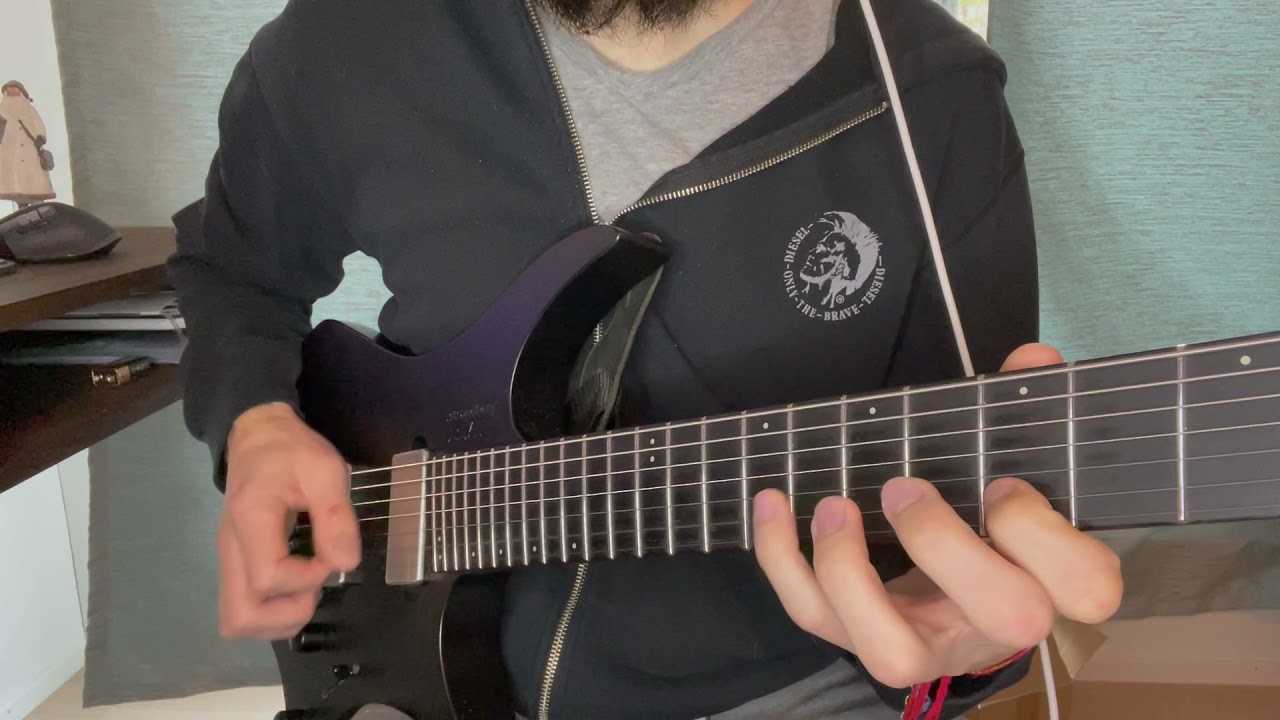 Roberto Barlocci playing a fast Paul Gilbert style shred lick on electric guitar
