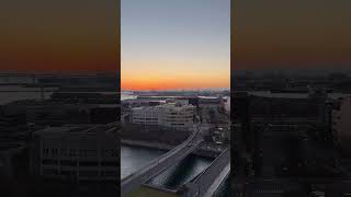 Stunning Sunrise Lit SkyOver Yokohama as Diamond Princess Cruise Ship Approaches Yokohama Bay Bridge