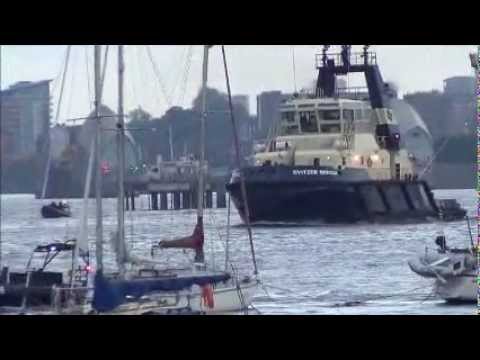 HMS Ocean sails up the Thames to Greenwich on Friday the 13th