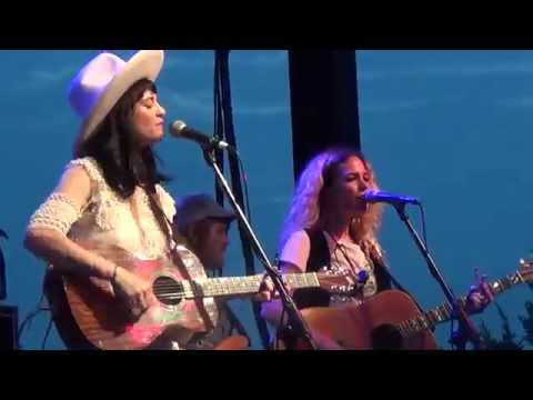 Nikki Lane getting escorted off the stage