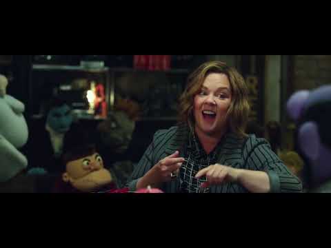 Trailer still where a bubblegum pop cue hard-cuts into gritty detective imagery