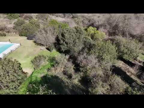 Terreno en venta en Tierra Alta, 1035 m2, pendiente negativa y fondo de reserva. Malagueño, Córdoba