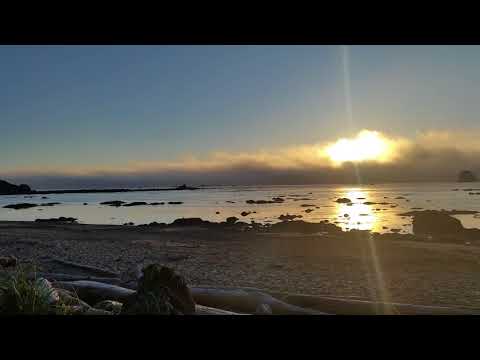 Video of the sun setting behind the fog line. 