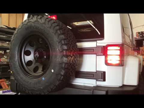 White Jeep JK Wrangler Sahara Pro Comp Lift & American Racing Wheels
