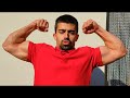 Flexing Biceps in Tight Shirt