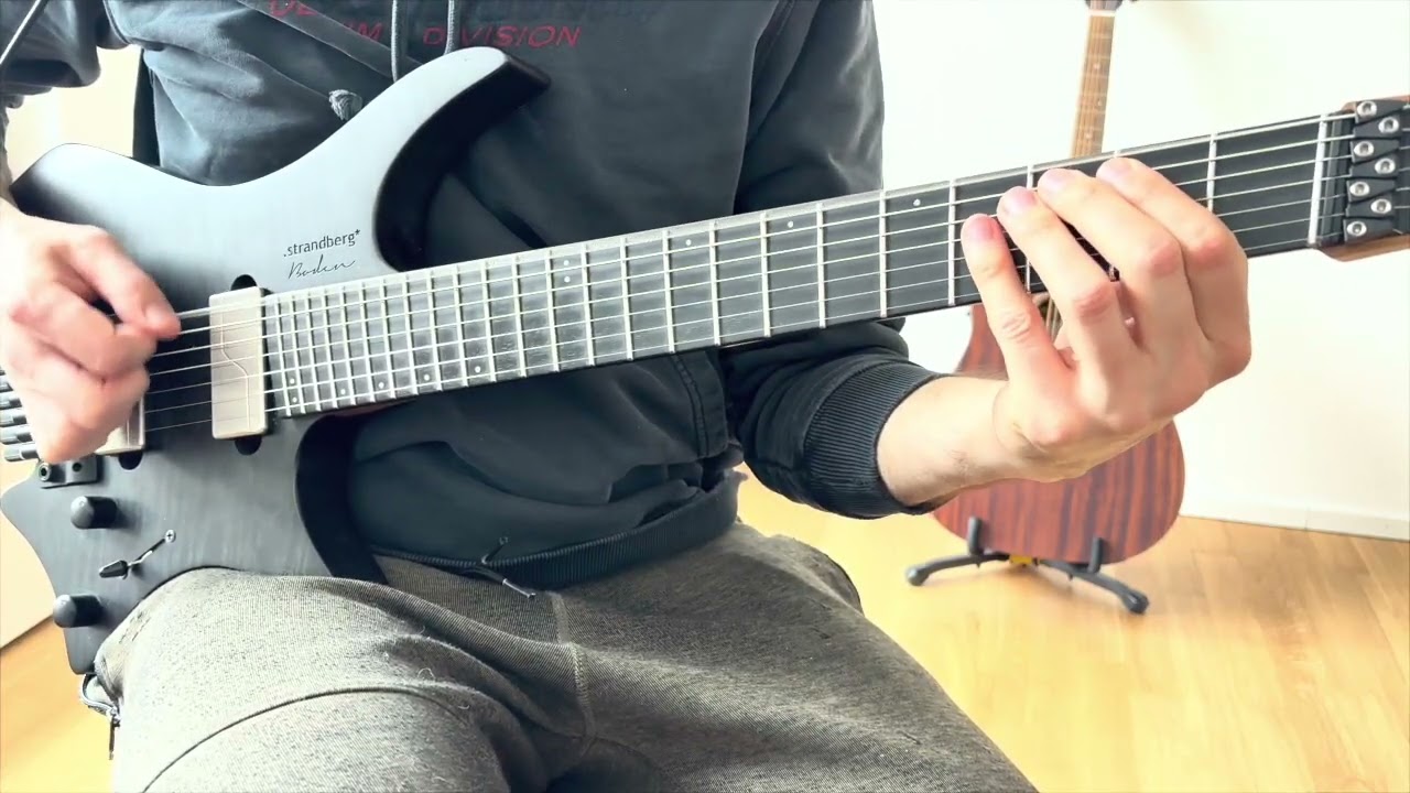 Guitar close-up demonstrating the palm-muted octatonic diminished-scale bridge riff from Arch Enemy's Nemesis.