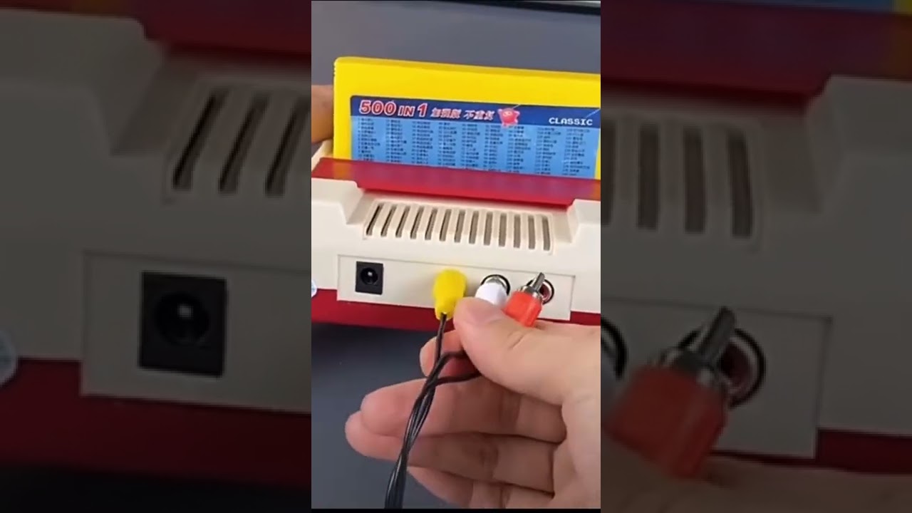 Famicom. Retro game console 90s