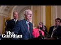 Republican Senate leader Mitch McConnell freezes during remarks to reporters