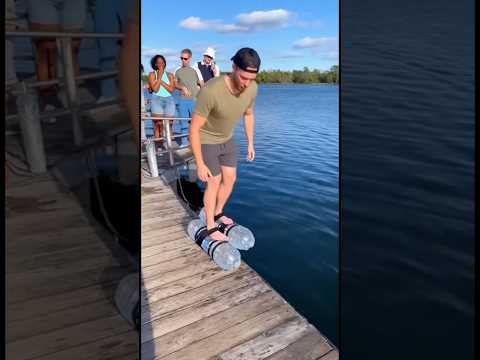 Guy using water bottles to run on water