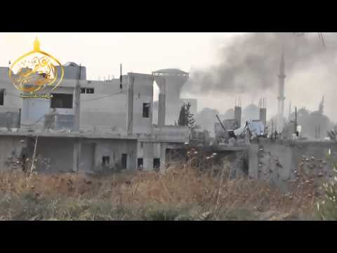 تصاعد الدخان من موقاع قوات النظام في مدينة درعا بعد استهدافهم من قبل فرقة القادسية