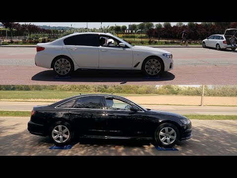Bmw 530i xDrive vs Audi A6 TDI Quattro - 4x4 test on rollers