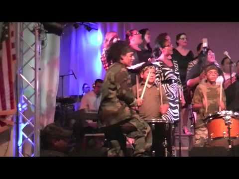 Jamie Aguilar Hernandez & SCDC Encore sings with Rhythms of War