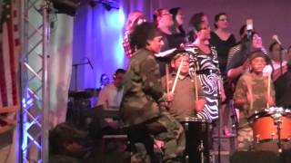 Jamie Aguilar Hernandez & SCDC Encore sings with Rhythms of War