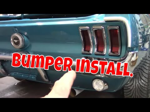 Mustang rear bumper and parts. License plate light. Jade part 77.