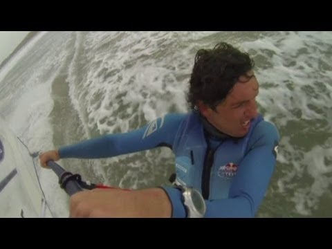 AMAZING VIDEO: Extreme windsurfers battle wind and 20ft waves
