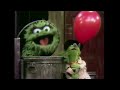 Sesame Street Lefty Tries To Sell Oscar A Balloon