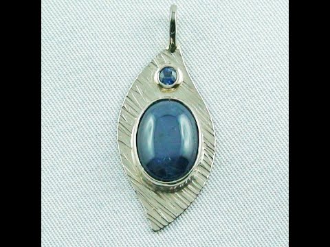 6,03 gr. Weißgold-Anhänger 18k mit Sternsaphir u. Saphir