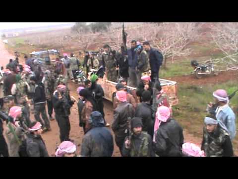 استعدادات مقاتلي كتيبة أبو عبيدة بن الجراح لبدء مجريات معركة السيطرة على حاجز السمان في محيط طيبة الإمام في ريف حماة