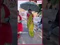 குடைப்பிடித்து நடந்து வரும் போதை தேவ