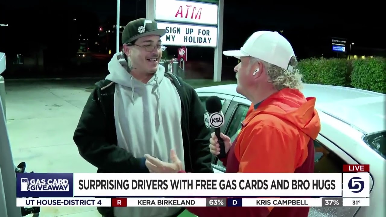 Casey Scott contemplating Christmas decorations in November while on gas card givaway