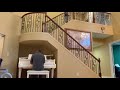 Neil playing a Schumann Baby Grand in a house for sale