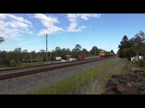 Pacific Nationals 9322 and 9323 lead a late running 6AB6 through Greenbank  6/6/22