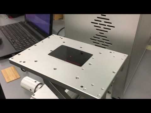 Radecal Piranha Fibre Marking Laser - demoing marking business cards & pet tags