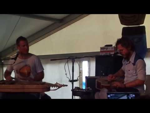 Andrew Winton giving John Butler a music lesson on Youthopia Stage, Fairbridge Festival 2013